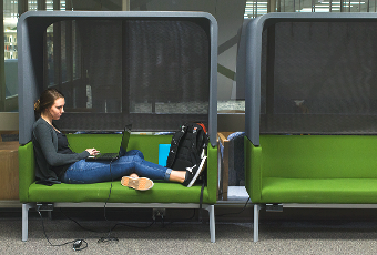 person in an individual study space